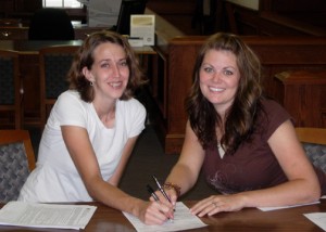 signing over our souls at the bank